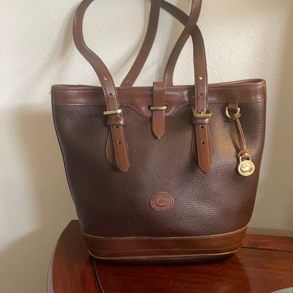 Dooney & Bourke Handbags - Dooney and Bourke brown leather bucket bag